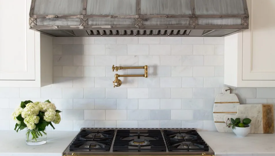 Close-up of kitchen range by Arcadia General Contractors